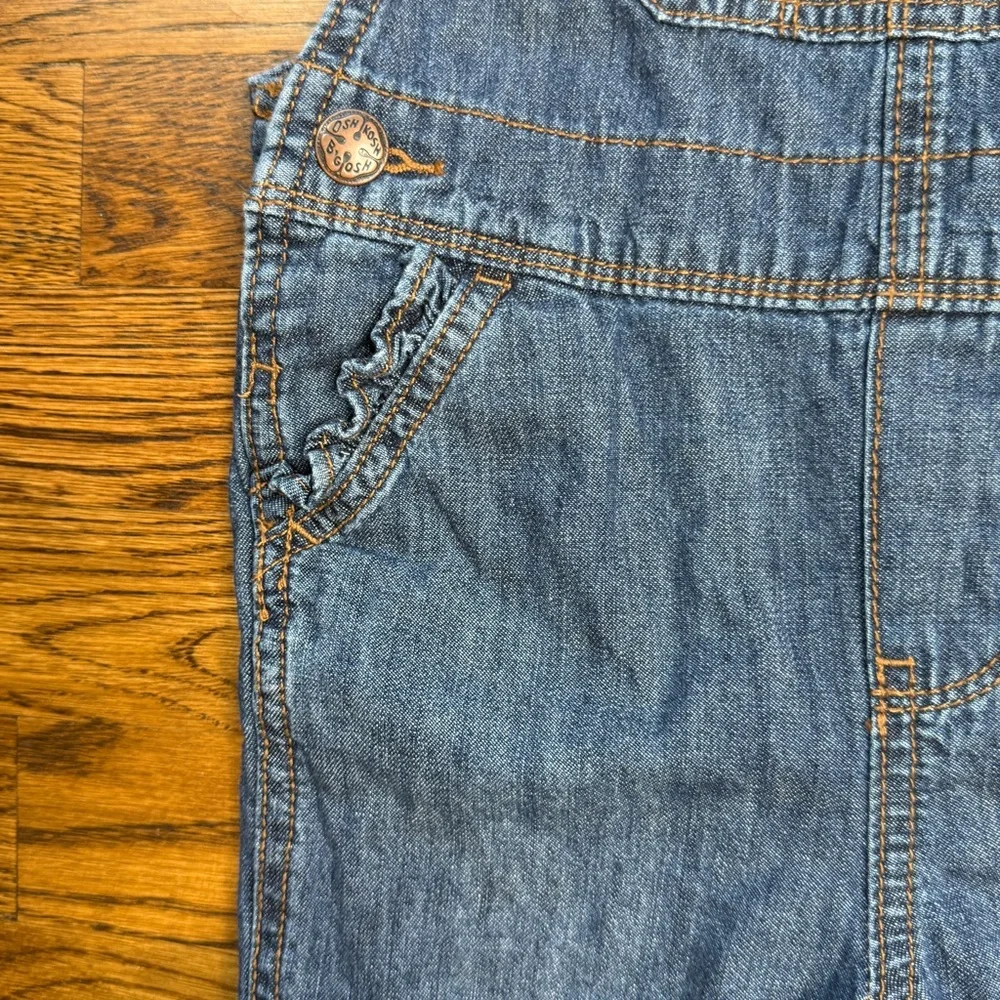 OshKosh B'gosh Girls Ruffled Pocket Soft Blue Denim Overalls Plaid Interior 3T